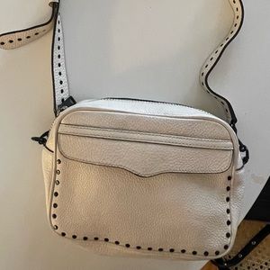 Cream Rebecca Minkoff crossbody purse with black hardware. Good condition.